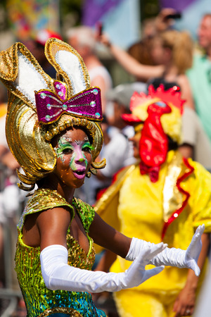 ROTTERDAM, THE NETHERLANDS - JULY 19, 2014, Carnival dancer at the Caribbean Carnival street parade on July 19 in Rotterdam, The Netherlandsのeditorial素材