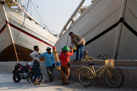 Jakarta, Indonesia - September 9, 2015: People near Makassar schooners (pinisi) in Sunda Kelapa, the old port of Jakarta, Indonesiaのeditorial素材