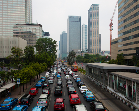 JAKARTA, INDONESIA - SEPTEMBER 9, 2015: traffic jam at Sudirman in Central Jakarta, Indonesia