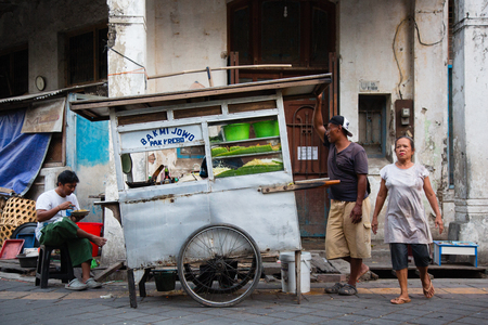 Semarang, Indonesia - September 13th, 2015: Traditional street scene with street sellers in Semarang, Indonesiaのeditorial素材