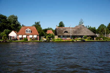Leeuwarden, The Netherlands - June 30 2019, Homes on the waterfront, the Netherlandsのeditorial素材