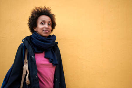 Portrait of a woman with afro hair with copy space