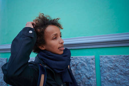 Portrait of a woman with afro hair with copy space