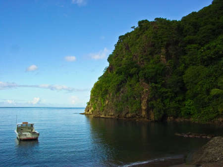 Glass Bottomed Boat sitting in a bay in Soufriere, Saint Lucia.