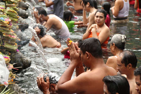 Ritual Bathing Purification Ceremony at Tampak Siring, Baliのeditorial素材