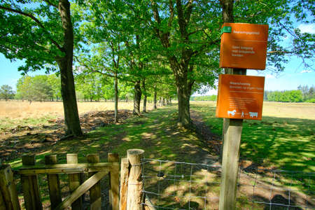 Borger, the Netherlands, May 19 2020, Entrance gate to nature reserve, grazing area, dutch sign,...