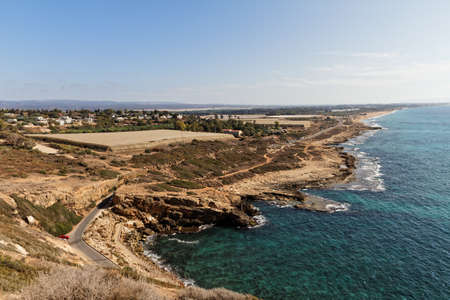 Aerial view of Israel's northern coastline, taken from the Rosh Hanikra view-point with a village and plastic greenhouses and plantations for fruits like bananasの写真素材
