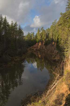 river with red sandstone cliffsの写真素材