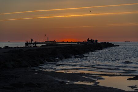 sunset at breakwaterの写真素材