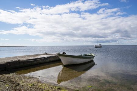 fishing boat and ship at seaの写真素材