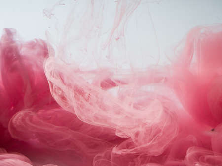 Abstract colored background. Pink smoke, ink in water, the patterns of the universe. Abstract...