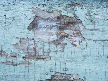 Cracked texture of the paint. Old paint on wooden surface close-up. View of top, Macro photography colored texture of backgroundの写真素材