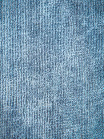 A full page of faux material. Macro textile, knitted fabric texture. View of top on background texture. Braided texture close-upの写真素材