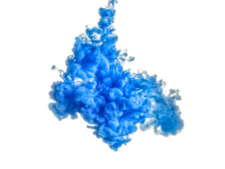 Ink swirl in water isolated on white background. The paint in the water. Soft dissemination a droplets of blue ink in water close-up. Abstract background. Explosion of splashes yellow acrylic ink.の写真素材