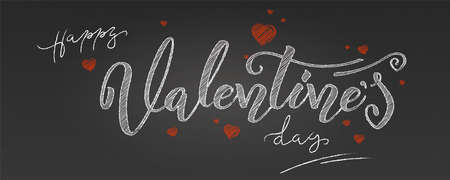 Valentine day. Holidays lettering, handwritten chalk inscription on school blackboard. Greetings with design of text in vintage style.の写真素材