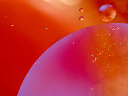 Yellow red abstract universe. Blurred background. Close up shot. Abstract molecule atom structure....