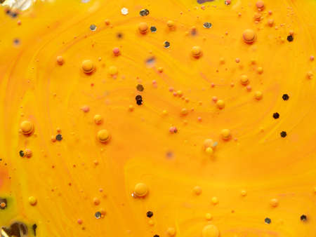 Pattern of multicolour spheres and hexagons on abstract background. Close up macro shot. Blurred background. Selective soft focus. Abstract orange universe. Colourful space of bubblesの写真素材