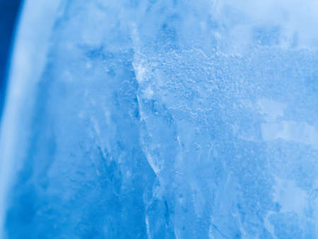 Different Ice texture close up. Macro shot. Soft focus. Blue background.の写真素材