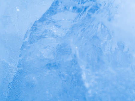 Macro view to ice crystals. Close up shot. Soft focus. Blue background.の写真素材