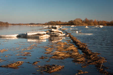 sprintime flooding with iceの写真素材