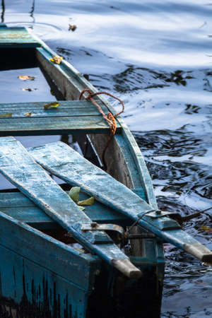The sunken wooden boatの写真素材