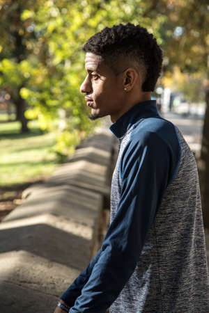 A portrait of a young, black athlete in New York City. Shot during the autumn of 2016.の写真素材