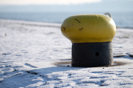 Bollard at the harborの写真素材
