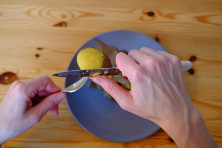 Cooked potatoes are cleanedの写真素材