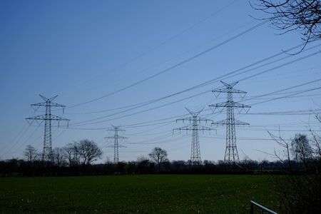 High voltage pylons on an agricultural field