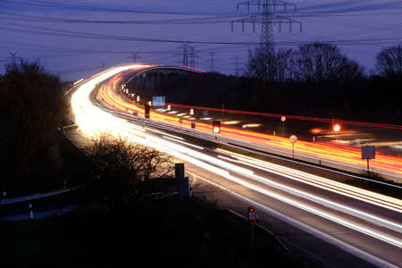 Rush hour traffic in the evening on the Rader BrÃ¼cke - A7 motorway over the Kiel Canalの写真素材