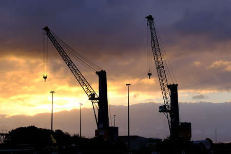 Industrial crane at the port in the morning light