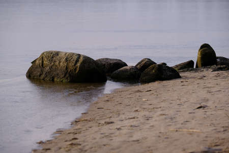 Rocks on a sandy beachの写真素材