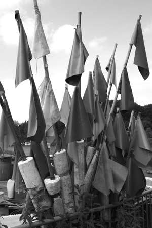 Black and white signal flags of a professional fishermanの写真素材