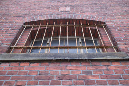 Metal grille in front of a window