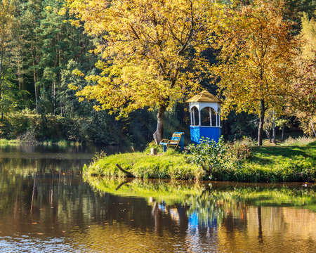 Beautiful autumn morning on the bank of the lakeの写真素材