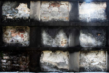 this grid has nine sections filled with old weathered peeling multicolored layers of stucco, brick,...