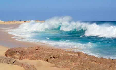 Huge Colorful Surf Pounds Beach in Mexico