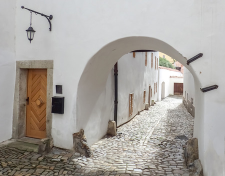 Cobblestone Alleyway in Cesky Krumlov Czech Republicの写真素材