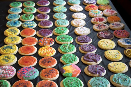 Rows of Frosted Multicolored Cookies with Sprinkles