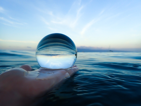 Ocean Surface Close Up Through Glass Ballの写真素材