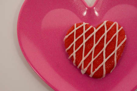 Love Cookie on pink plateの写真素材