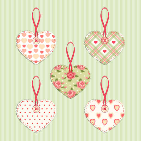 Set of vintage fabric handmade hearts with ribbon and button in shabby chic styleのイラスト素材