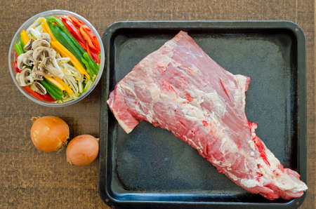 preparing meat with vegetables