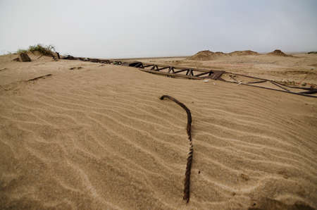 steel cable and column on the beach in industrial area of ???? the port
