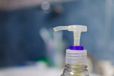 peak of liquid soap container in the bathroomの写真素材