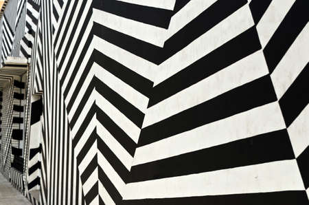 wall painted with white and black stripesの写真素材