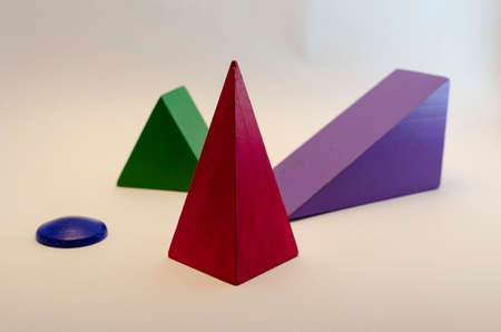 Colorful geometrical figures of wood, educational game.の写真素材