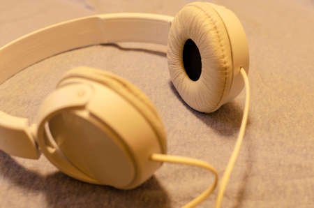 Headphones different colors. man womanの写真素材