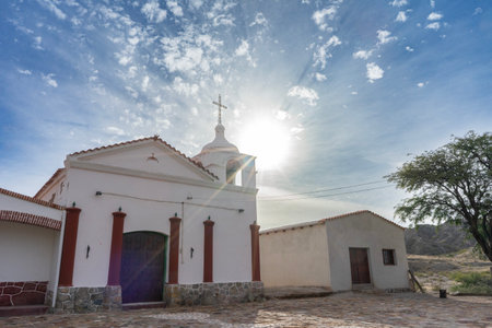 Santa Rosa, Salta, Argentina - 04.22.2025: The morning sun on the bell tower of the Santa Rosa...