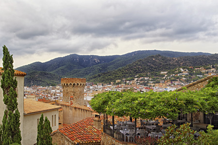 Tossa de Mar Catalonia Spain roofs in stormy weatherのeditorial素材